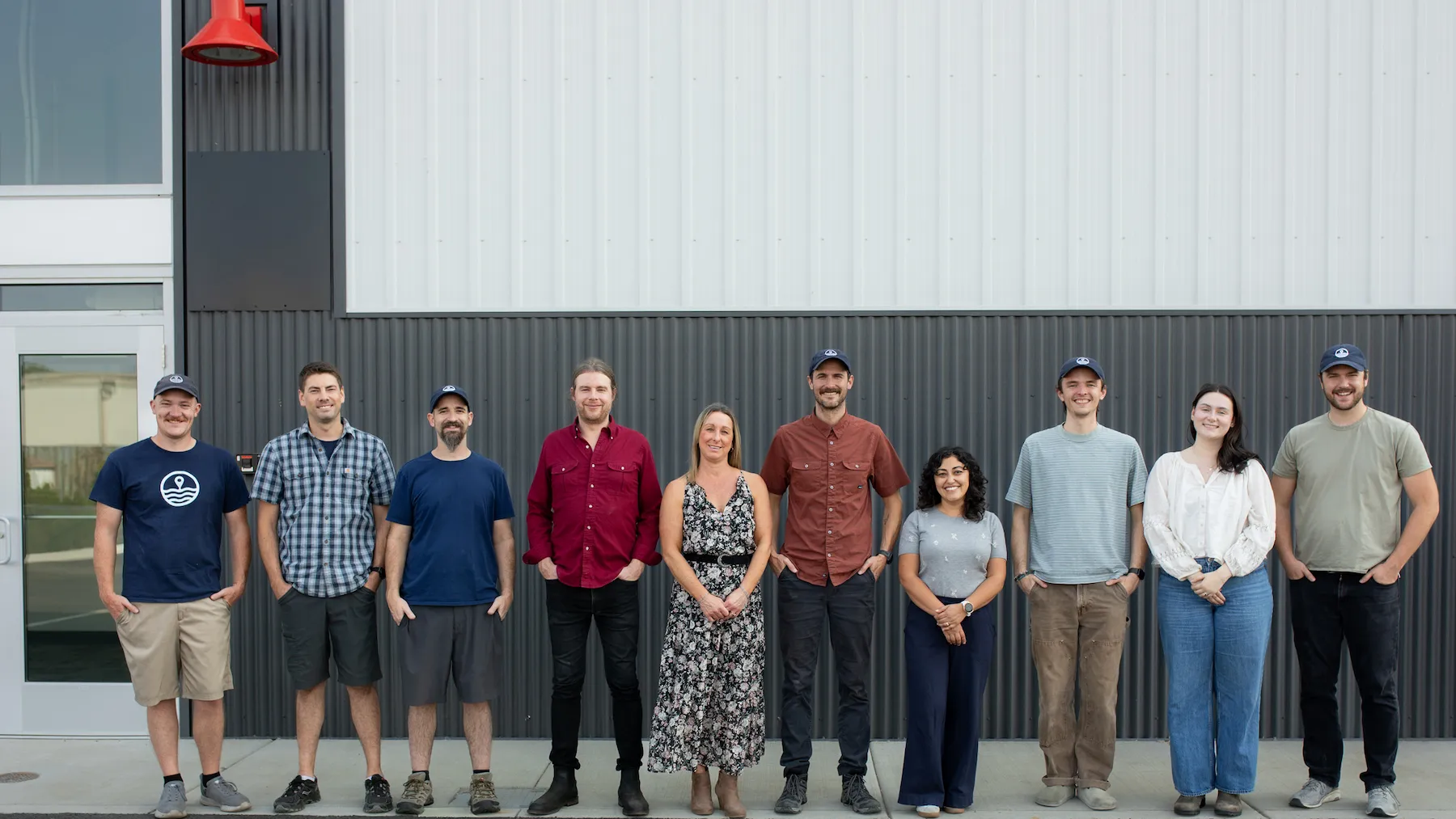Wassoc subsea engineering team standing outside the company facility