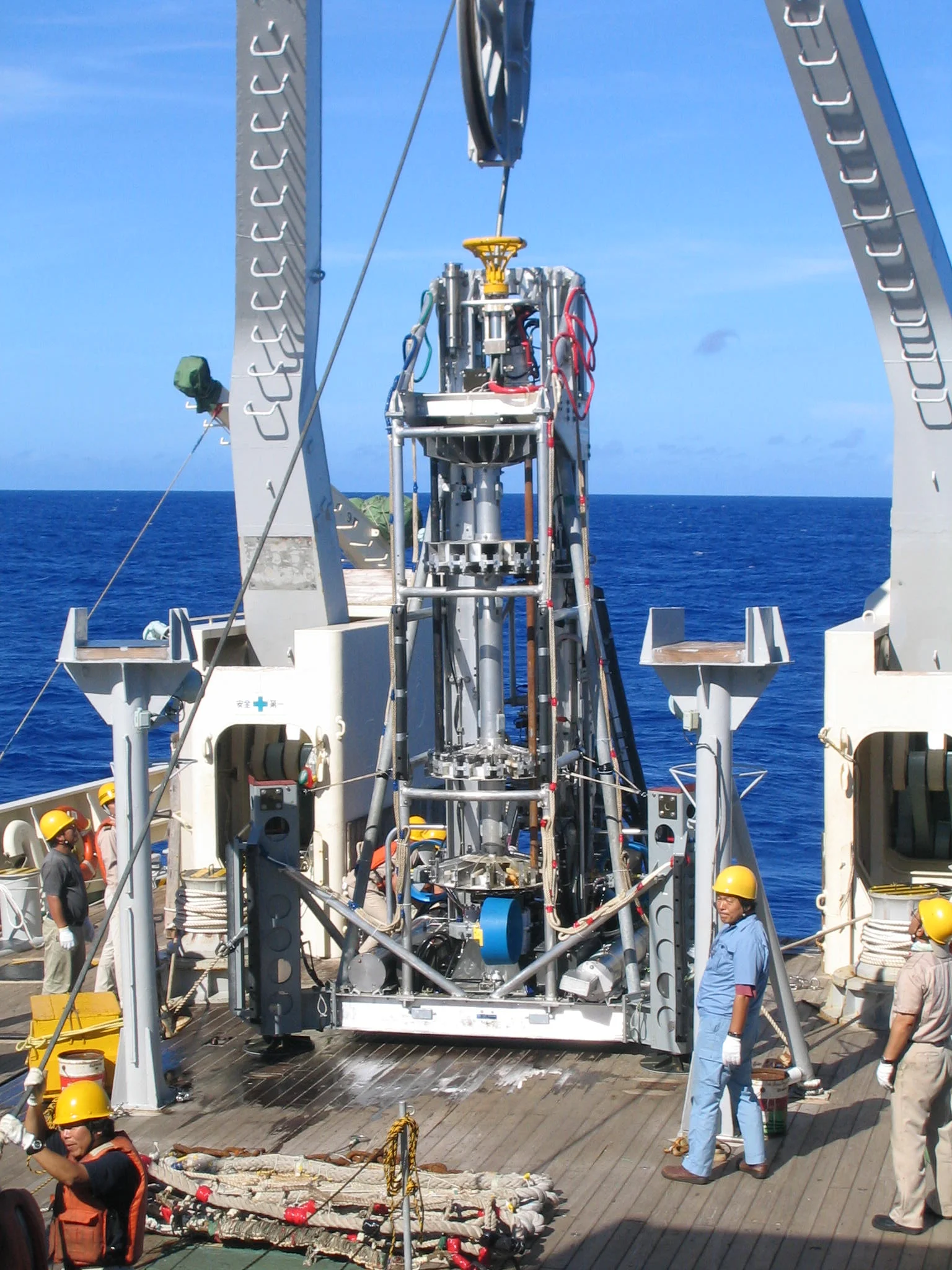 Original BMS seafloor lander drill on back deck of ship with rotational tool handling and landing feet for hard seafloor sediment